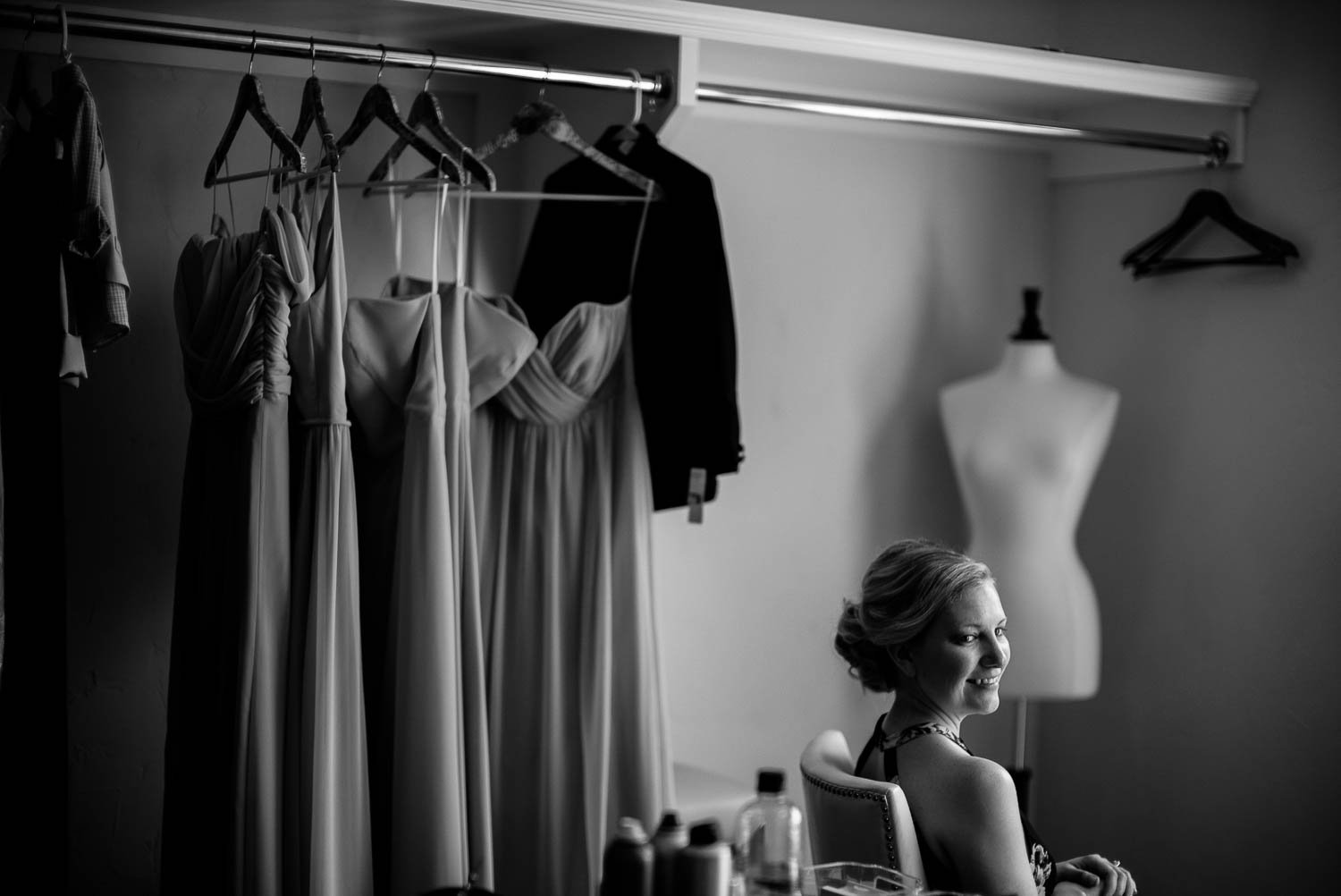 Bride looks over shoulder at Bell Tower on 34th Houston-Leica wedding photographer-Philip Thomas Photography