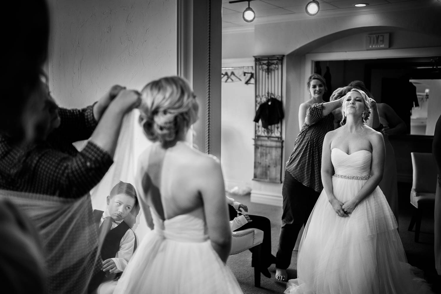 A little looks bored and tired as check the bride at Bell Tower on 34th Houston-Leica wedding photographer-Philip Thomas Photography