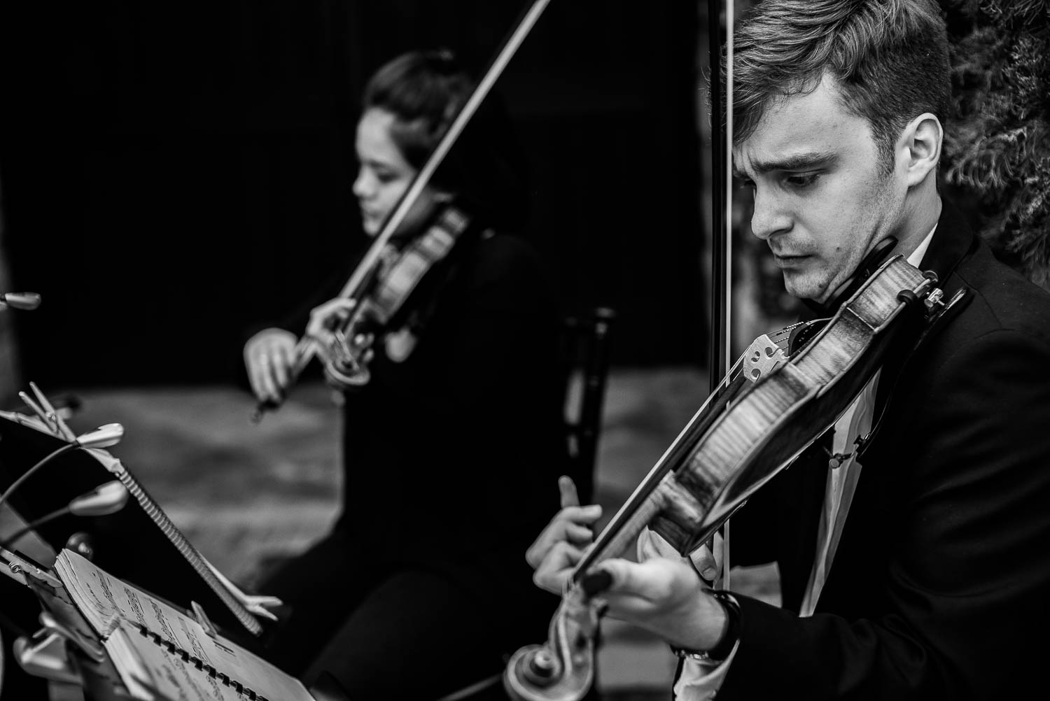 Violinists play a wedding Bell Tower on 34th Houston-Leica wedding photographer-Philip Thomas Photography