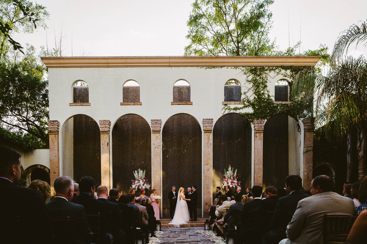 Low view of wedding ceremony in aisle Bell Tower on 34th Houston-Leica wedding photographer-Philip Thomas Photography