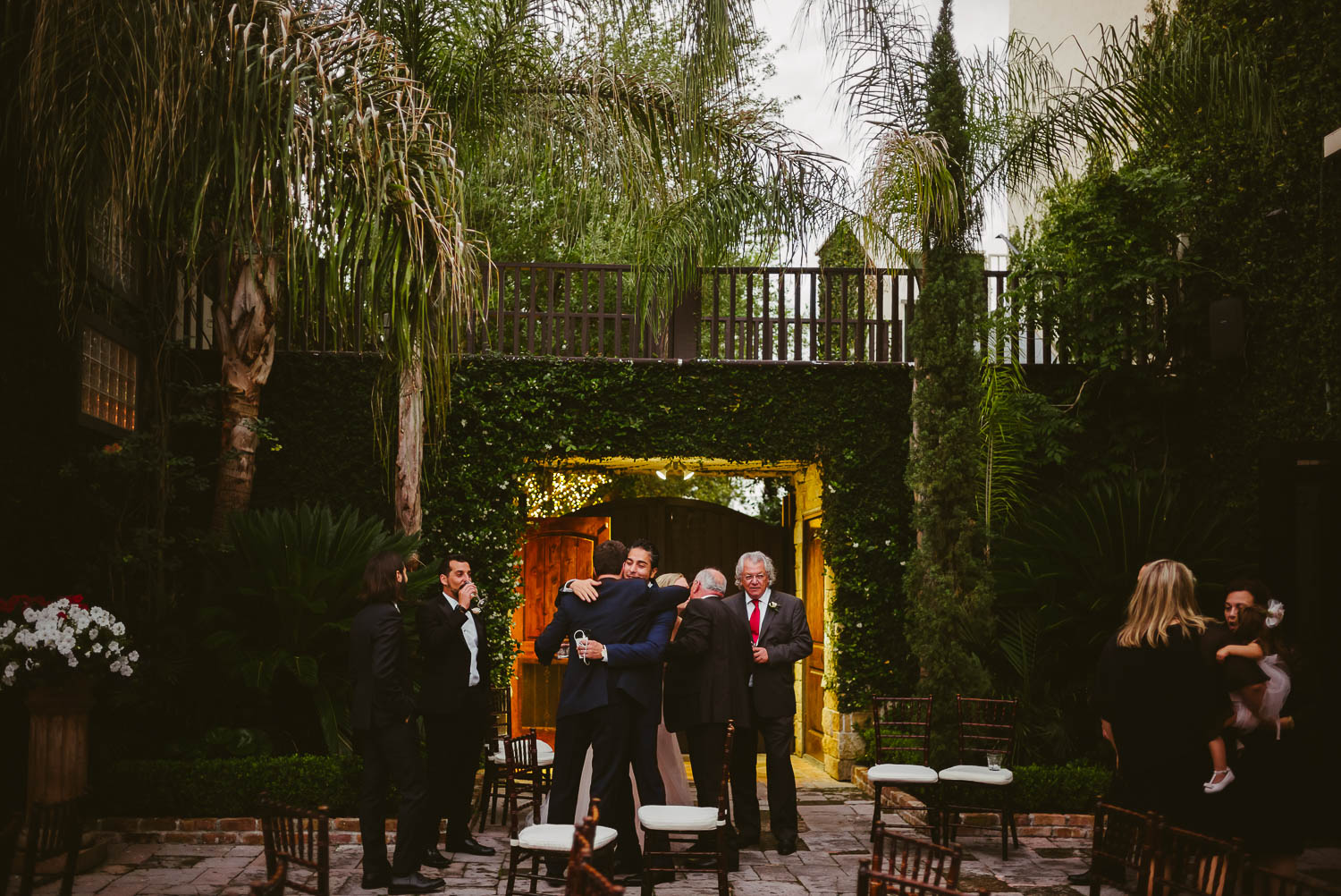 Guest chat and enjoy drinks cocktail hour wedding Bell Tower on 34th Houston-Leica wedding photographer-Philip Thomas Photography