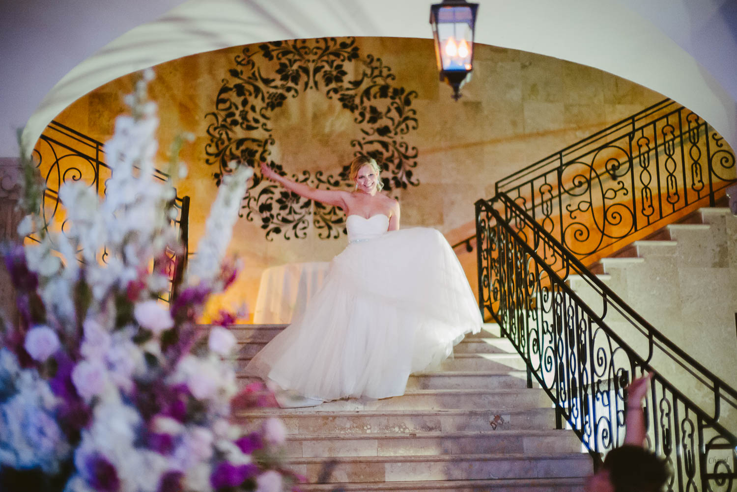 Bride makes fashionable arrival down staircase -Bell Tower on 34th Houston-Leica wedding photographer-Philip Thomas Photography
