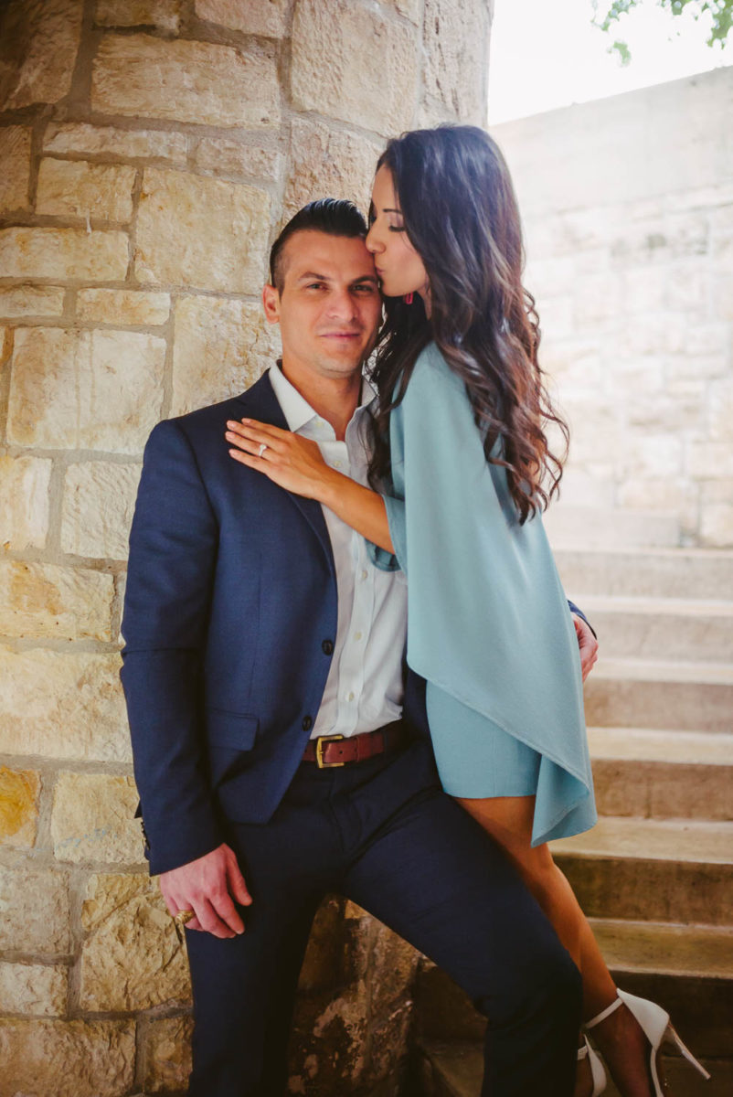 Across from Havana Hotel in a starirwell leading down to the Riverwalk Downtown San Antonio Engagement photos-05