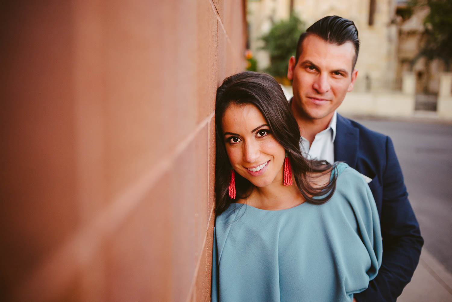 Central library red wall show couple Downtown San Antonio Engagement photos-08