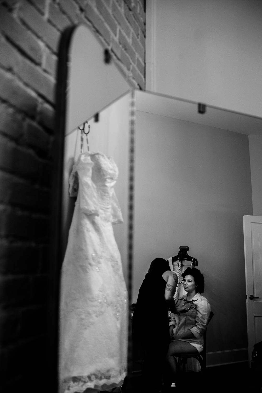 Brides dress hangs at Za Za gardens-Leica photographer-Philip Thomas Photography