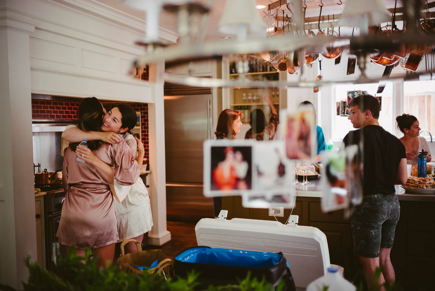 Sisters hug on a wedding morning at a Aunt's home-Leica photographer-Philip Thomas Photography