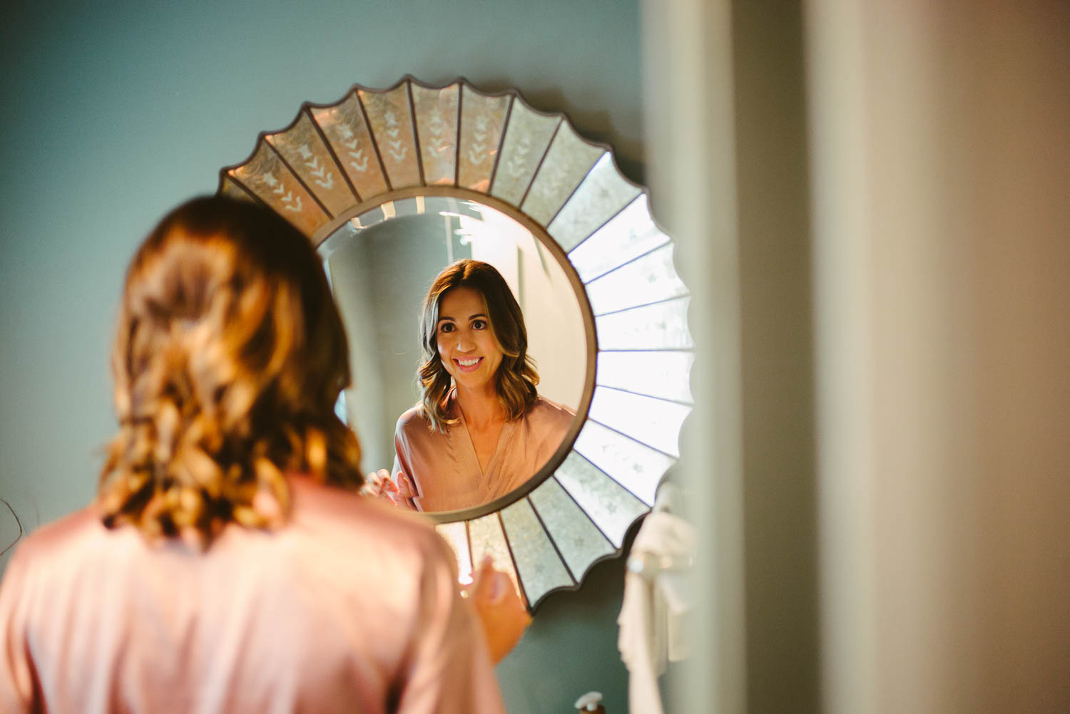 Bride checking mirror-Leica photographer-Philip Thomas Photography