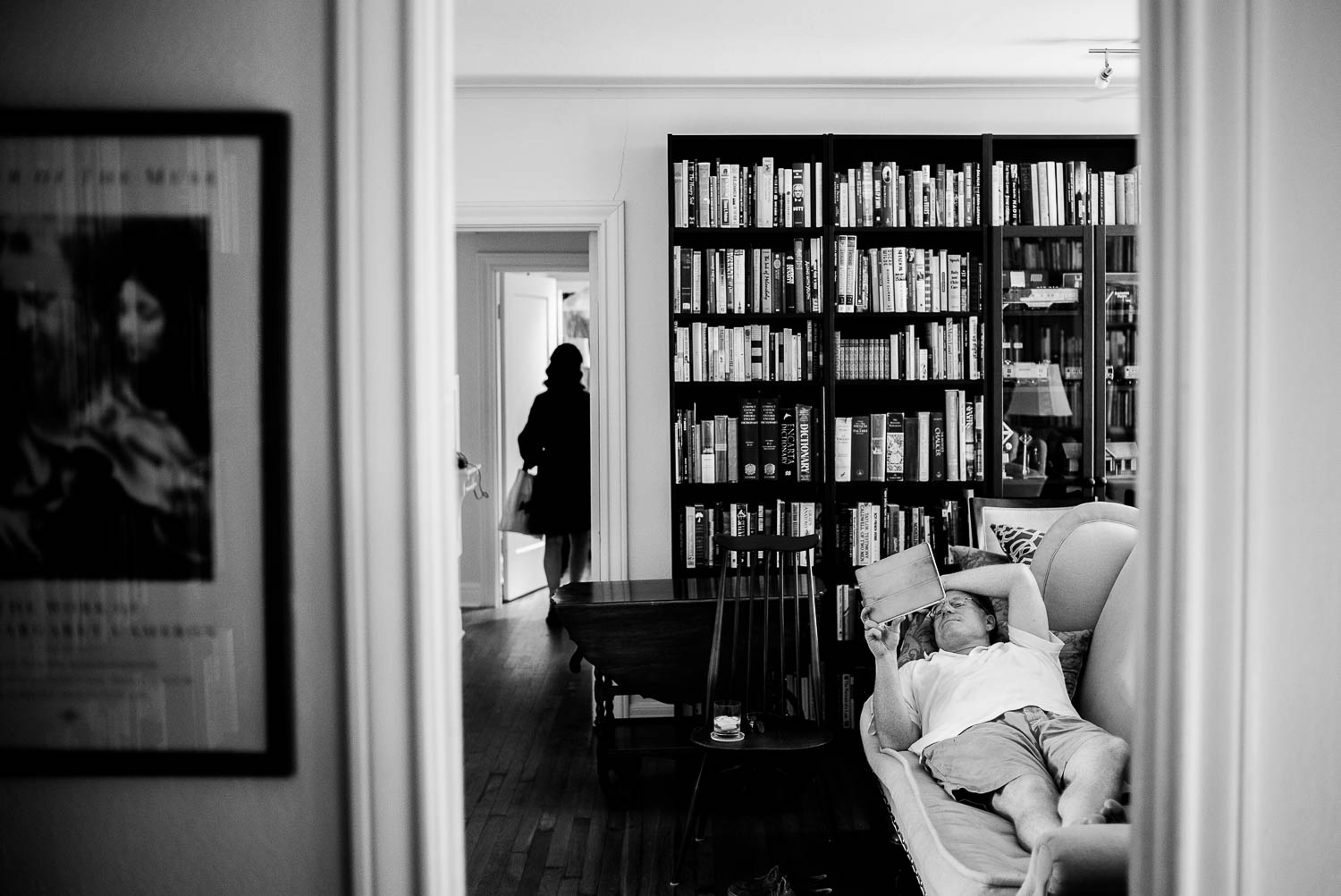 Bride's uncle relaxes on a couch during a busy wedding morning-Leica photographer-Philip Thomas Photography