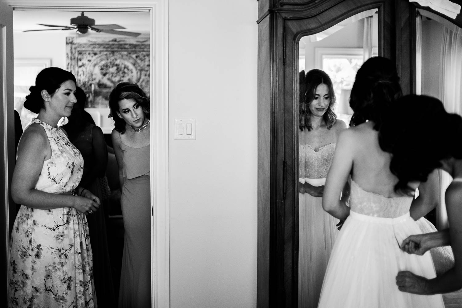 The bride with help from her mother and friends look on at her aunt's home in Houston Texas-Leica photographer-Philip Thomas Photography