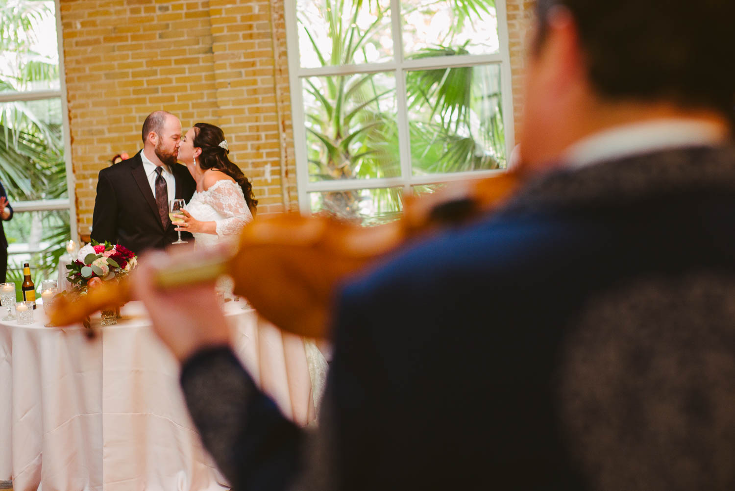 The mariachi band plays for a wedded couple at Za Za Gardens Wedding Reception-Leica photographer-Philip Thomas Photography