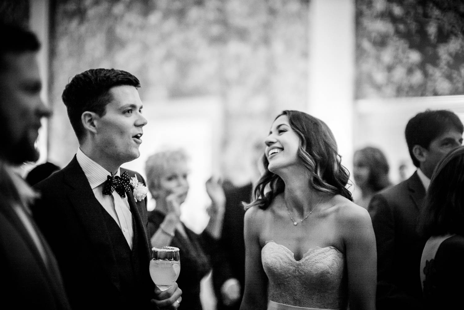 Couple laughing on reception floor River Oaks Country Club-Leica photographer-Philip Thomas Photography