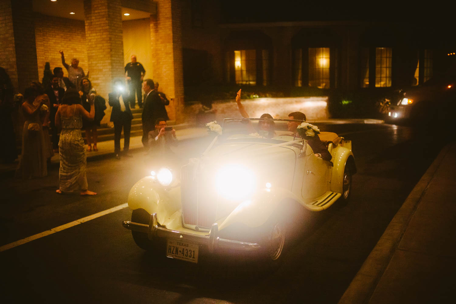 Historic MG car pulls away driven by groom -River Oaks Country Club-Leica photographer-Philip Thomas Photography