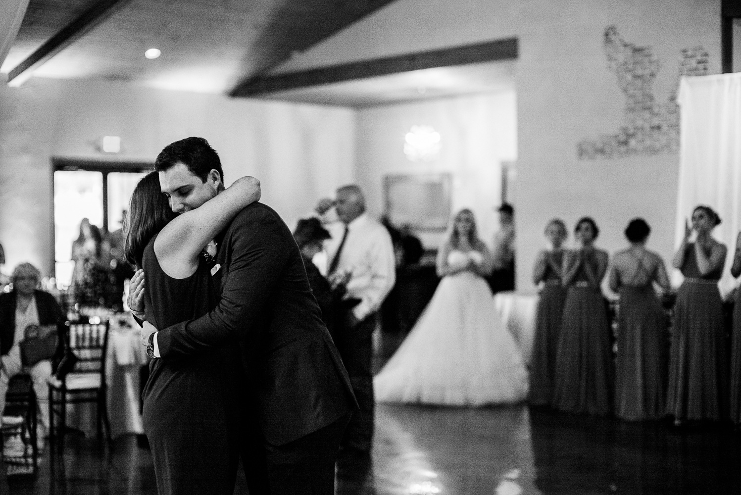 Mother and son hug wedding first dance Chandelier of Gruene Wedding Reception-32