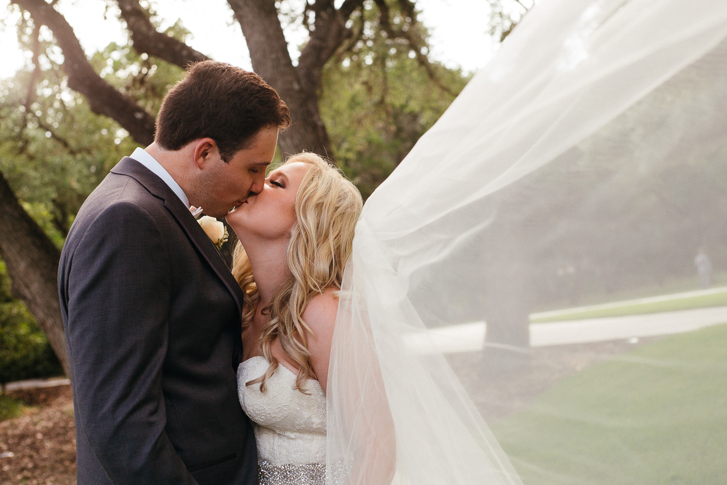 Couples pose image at Chandelier of Gruene Wedding Reception-43