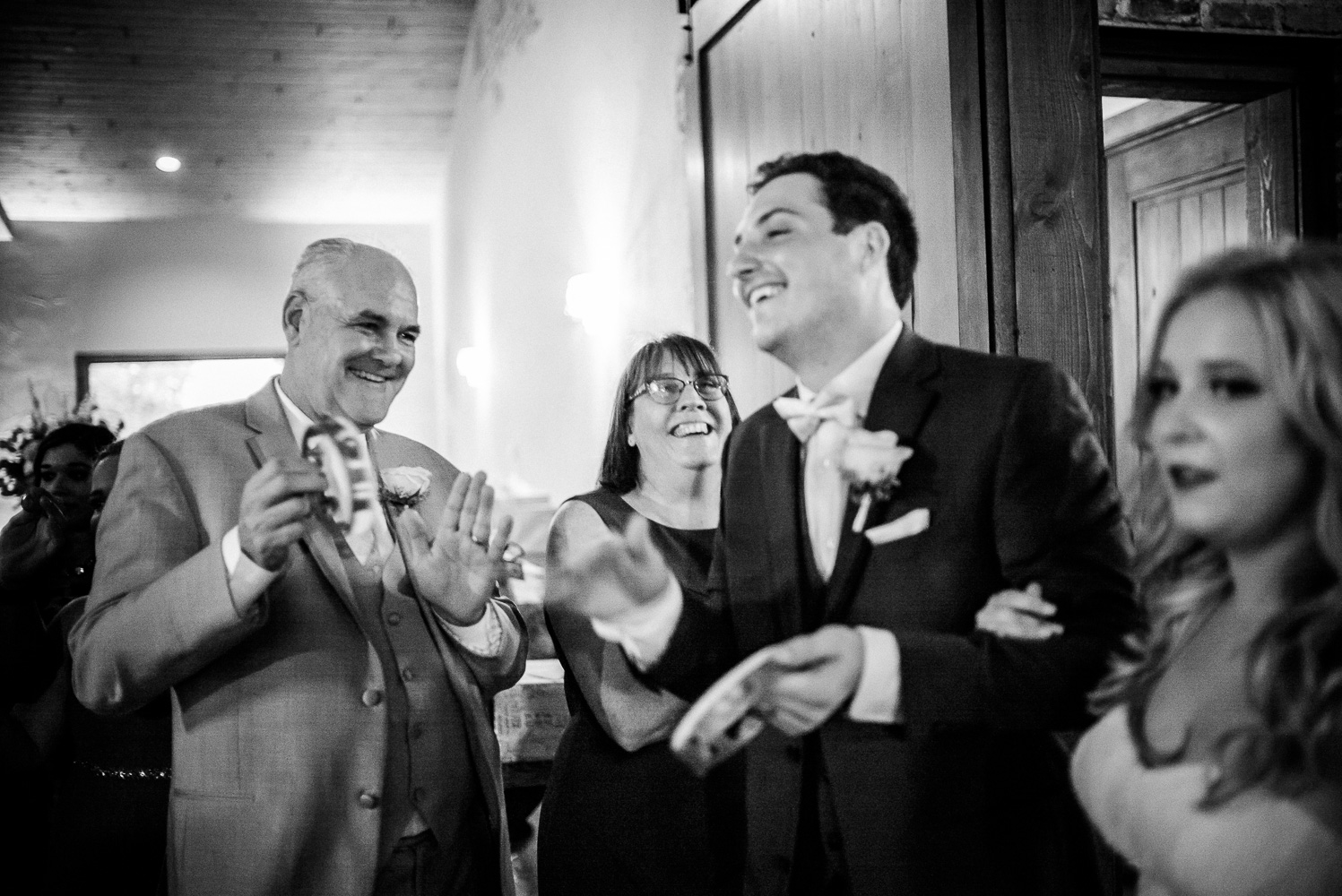 Parents of the groom enjoy a moment at Chandelier of Gruene Wedding Reception-46