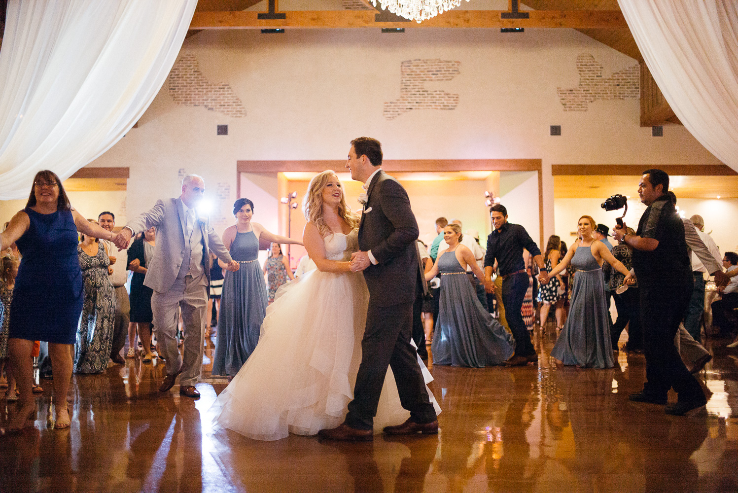 Couple Kailey and Grant havetheir first dance together at Chandelier of Gruene Wedding Reception-47