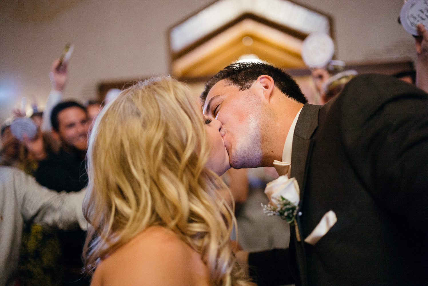 Couple kiss reception floor Chandelier of Gruene Wedding Reception-49