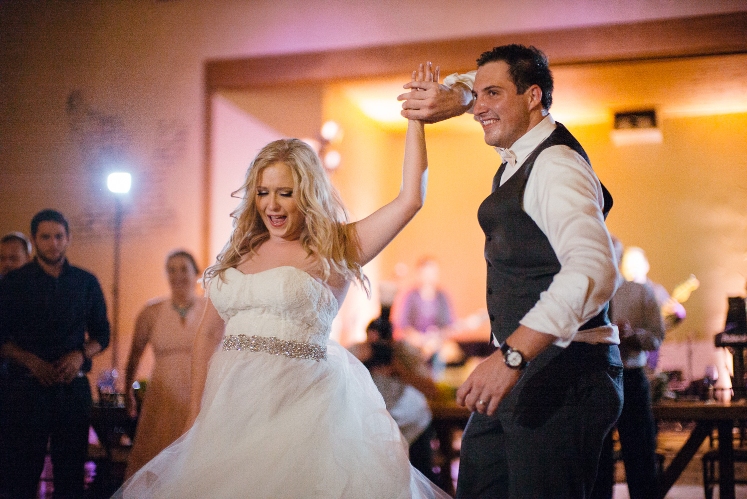 Bride and groom celebrate the night at Chandelier of Gruene Wedding Reception-61