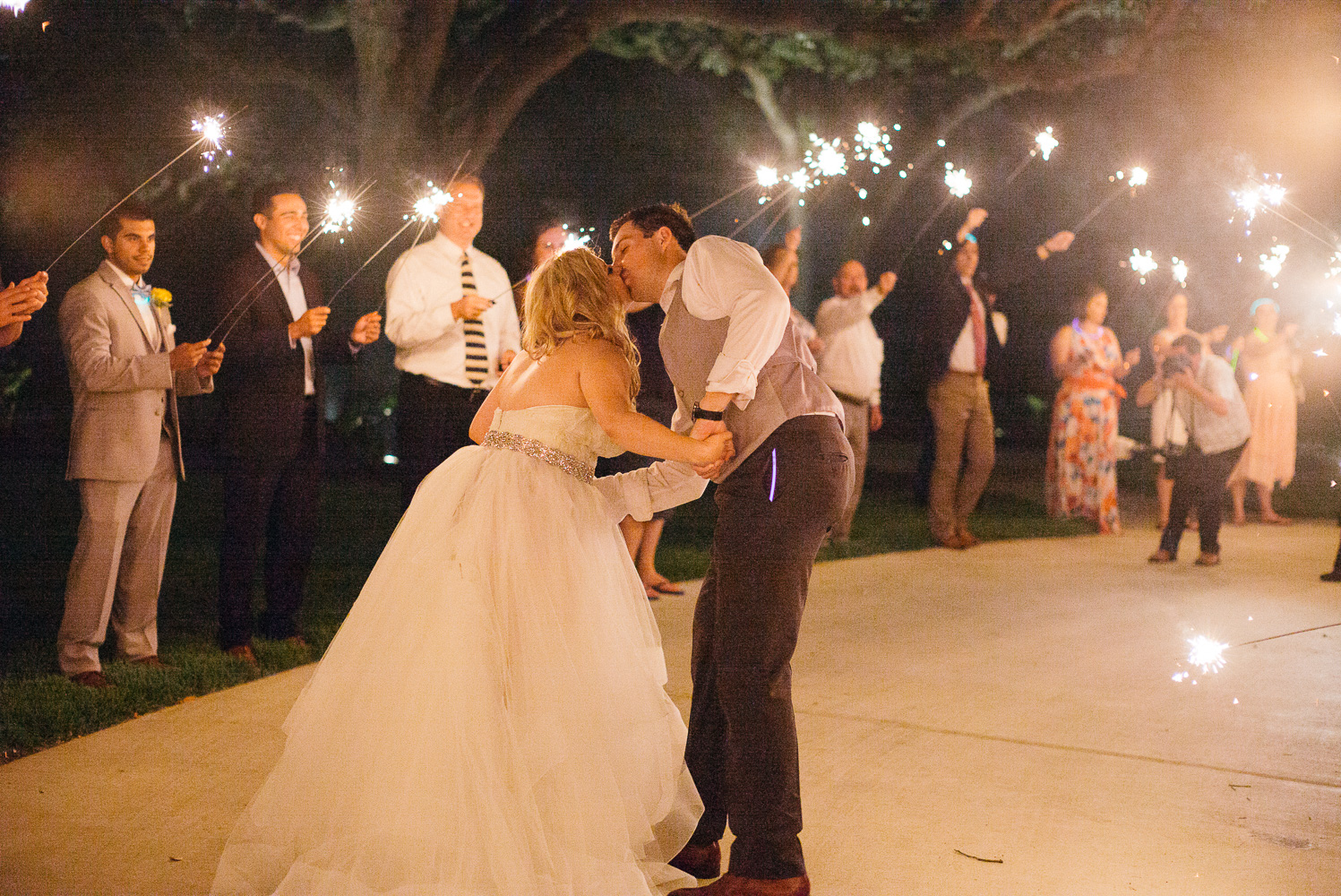 The farewell kiss at Chandelier of Gruene Wedding Reception-69