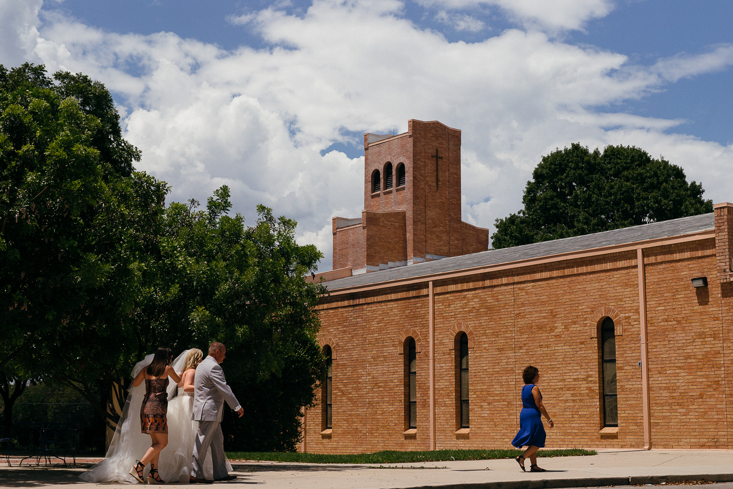 Bride and father walk to the church at Our Lady of Perpetual Help Wedding-15