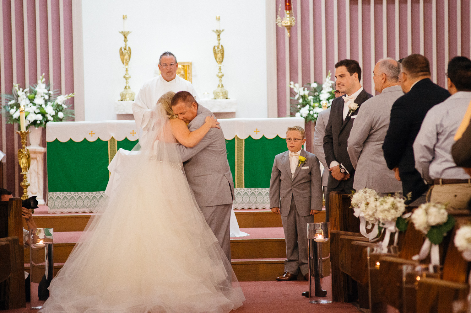 Father gives away his daughter Our Lady of Perpetual Help Wedding-17