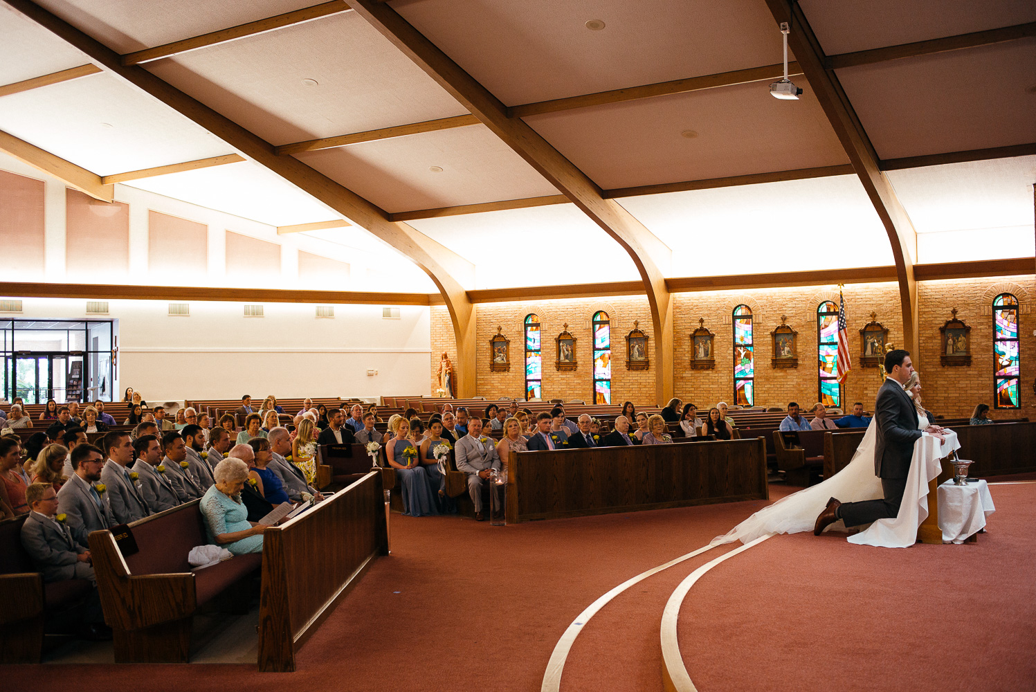 Wide shot of wedding ceremony Our Lady of Perpetual Help Wedding-18