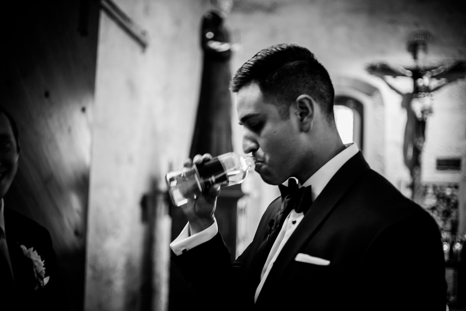 Grroom quenches his thirst moments before wedding ceremony San Fernando Cathedral Wedding-20