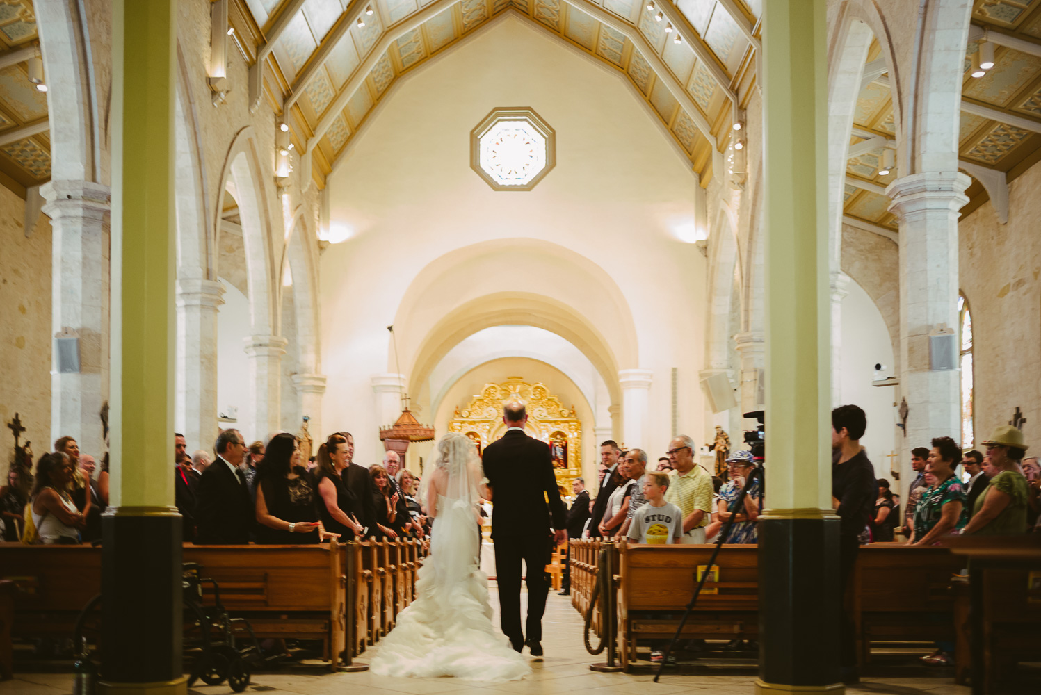 Bride and father walk down the aisle at wedding ceremony in July 1 2017 San Fernando Cathedral Wedding-21