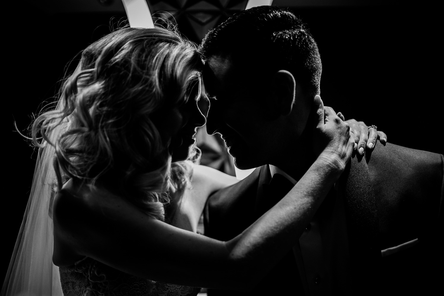 Almost silouette with strong backlight captured in a restroom St. Anthony Hotel San Antonio Wedding Reception-34