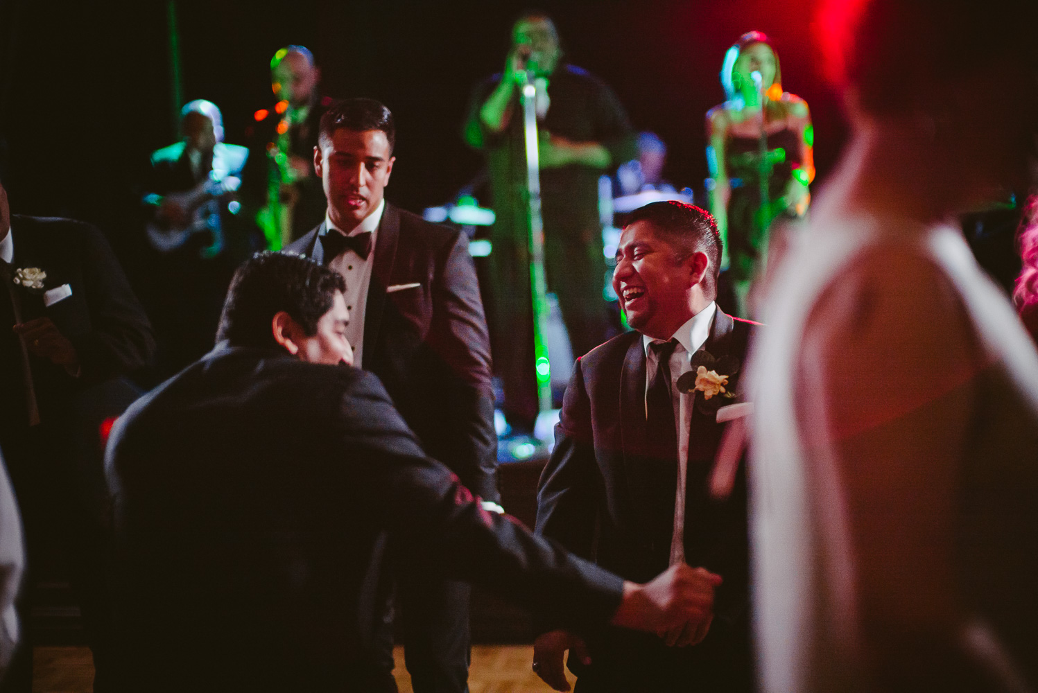 Groomsman dances with the groom wedding reception St. Anthony Hotel San Antonio Wedding Reception-54