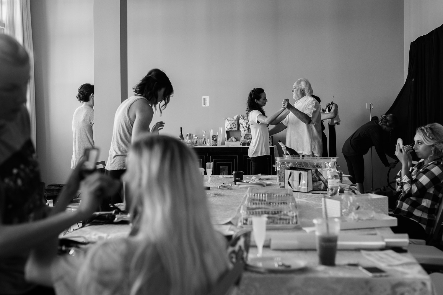 Bride and bridesmaids get ready in a large hotel room Wedding St Anthony Reception-Philip Thomas