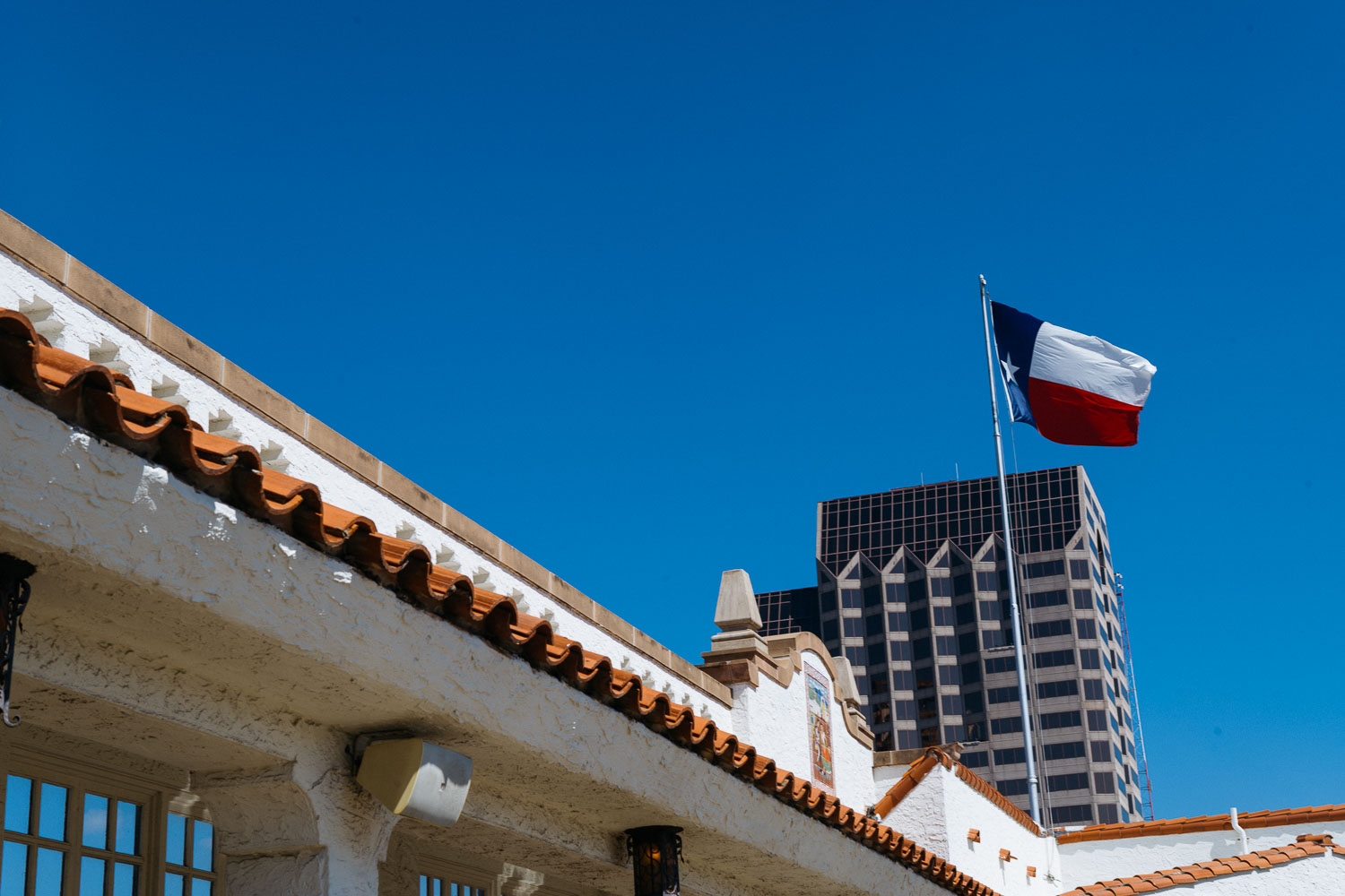 From the roof of St Anthony shows the Texas flag