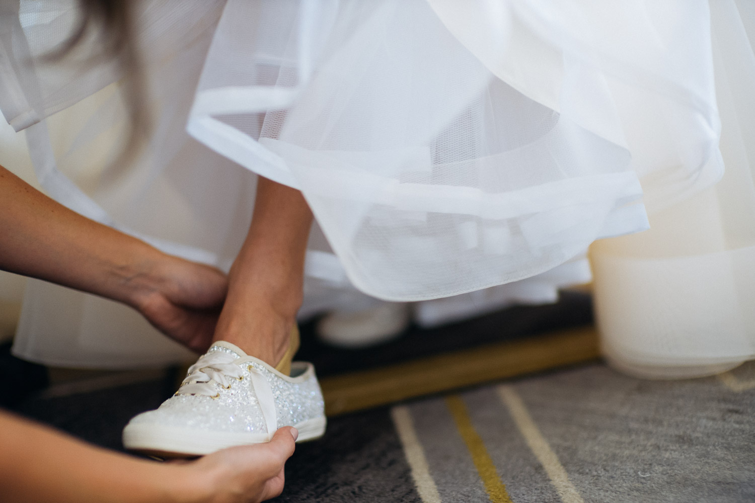 Bride gets shoes on Wedding St Anthony Reception-Philip Thomas