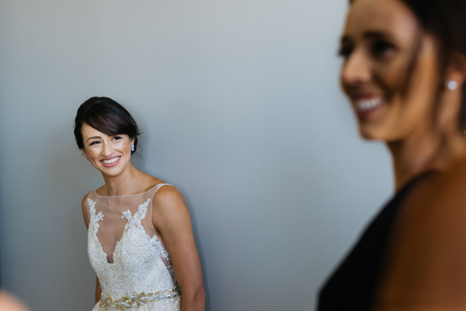 A very happy bride surrounded by bridesmaids Wedding St Anthony Reception-Philip Thomas