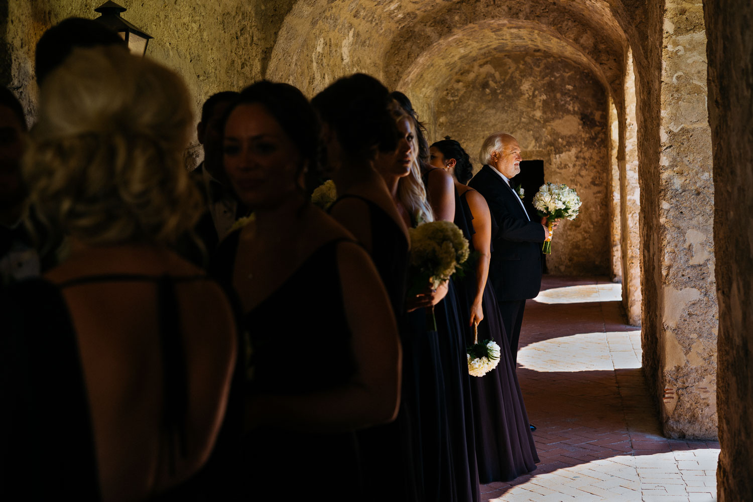 Father of the bride waits for his daughter at Mission Concepcion Wedding