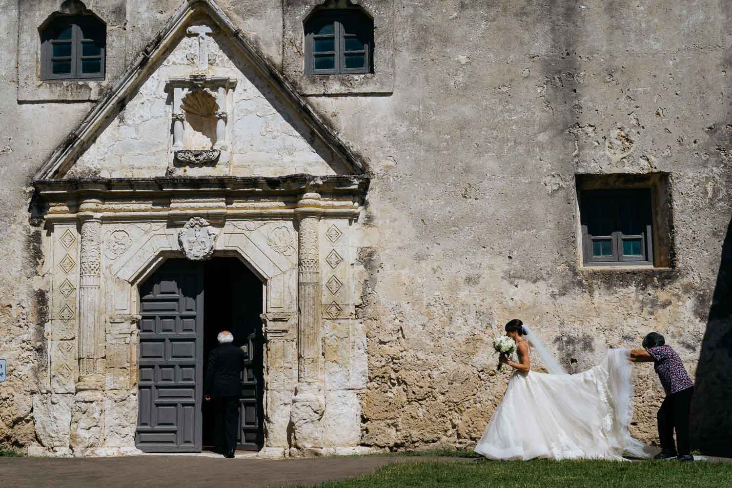 Bride walks toward Mission Concepcion Wedding