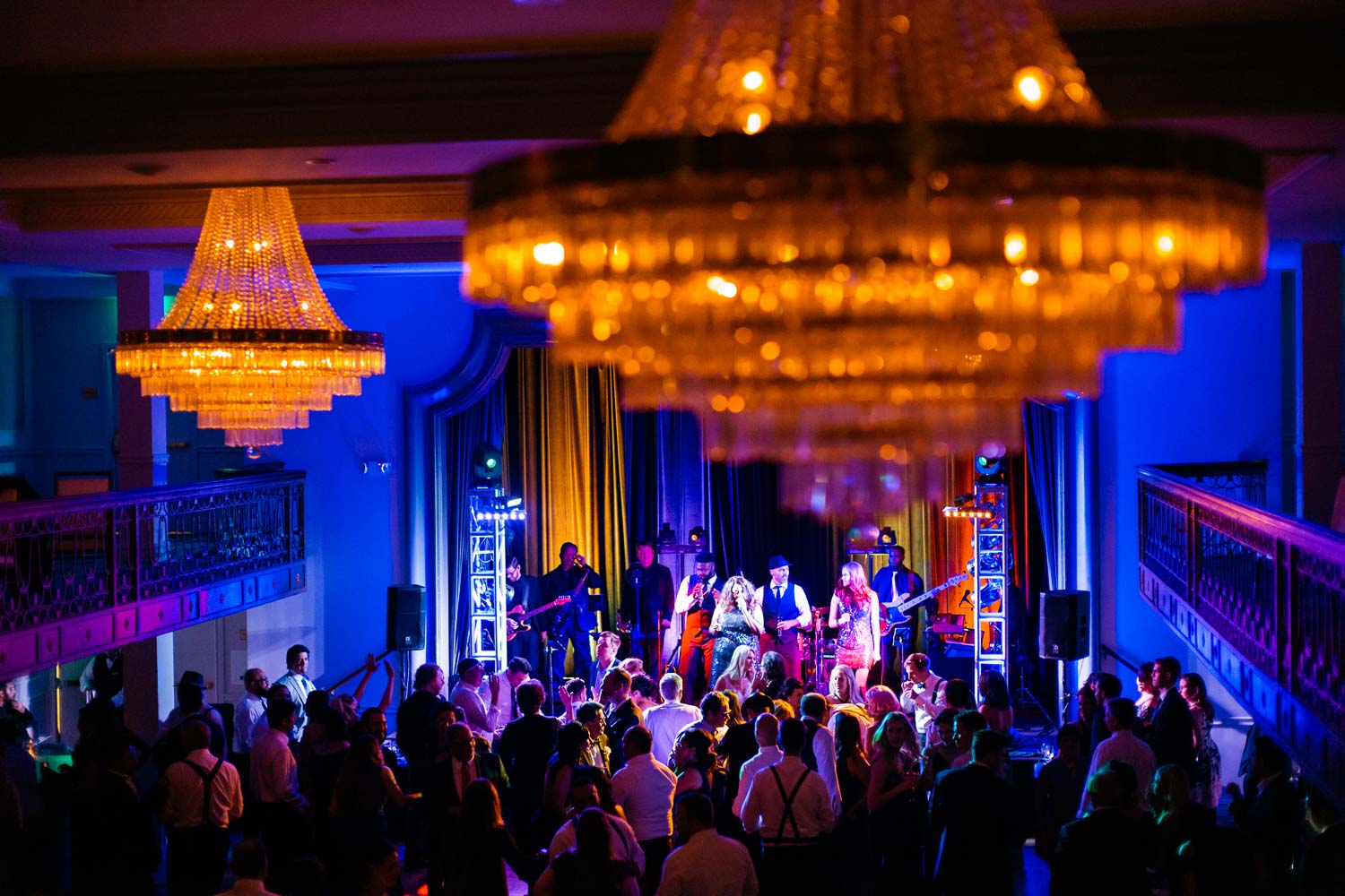 Wide angle shot of wedding reception and Match Maker band performing at a wedding reception St Anthony