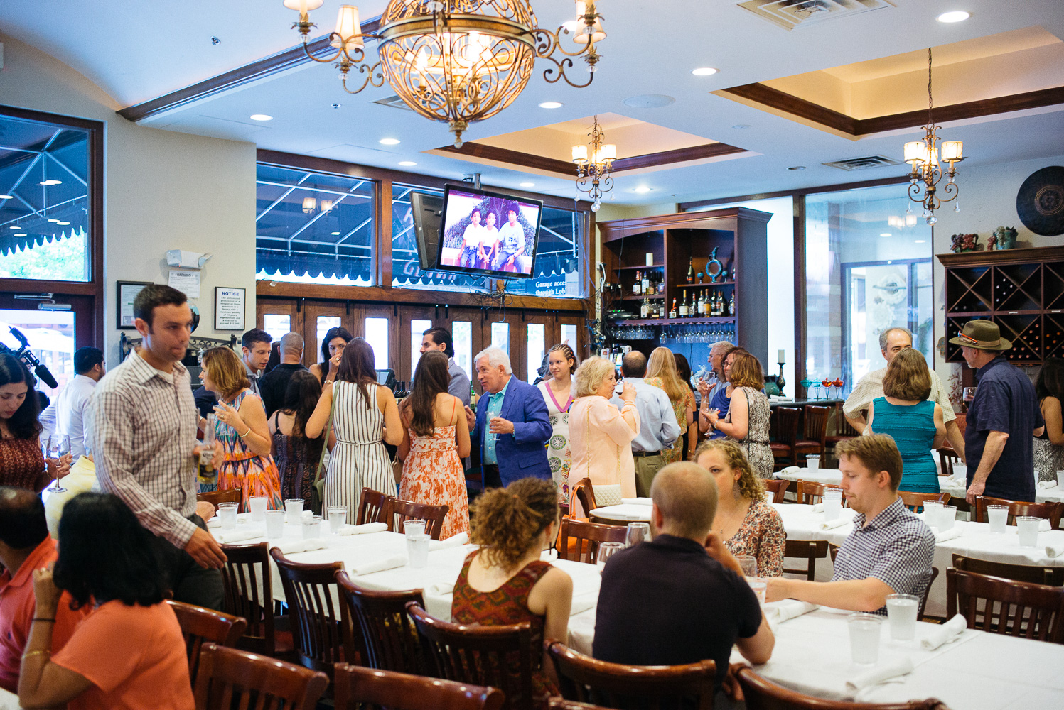 Wide shot of rehearsal dinner at Turquoise restaurant Hindu Jewish fusion wedding Sugar Land Marriott Hotel Texas-003