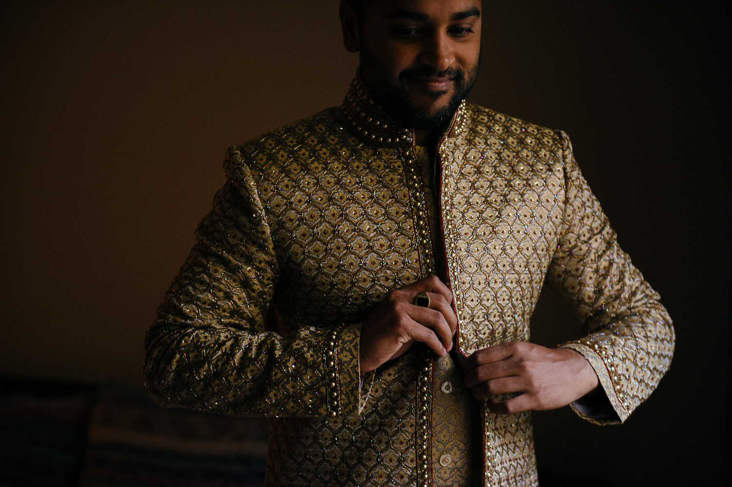 Groom buttons his jacket Hindu Jewish fusion wedding Sugar Land Marriott Hotel Texas-013