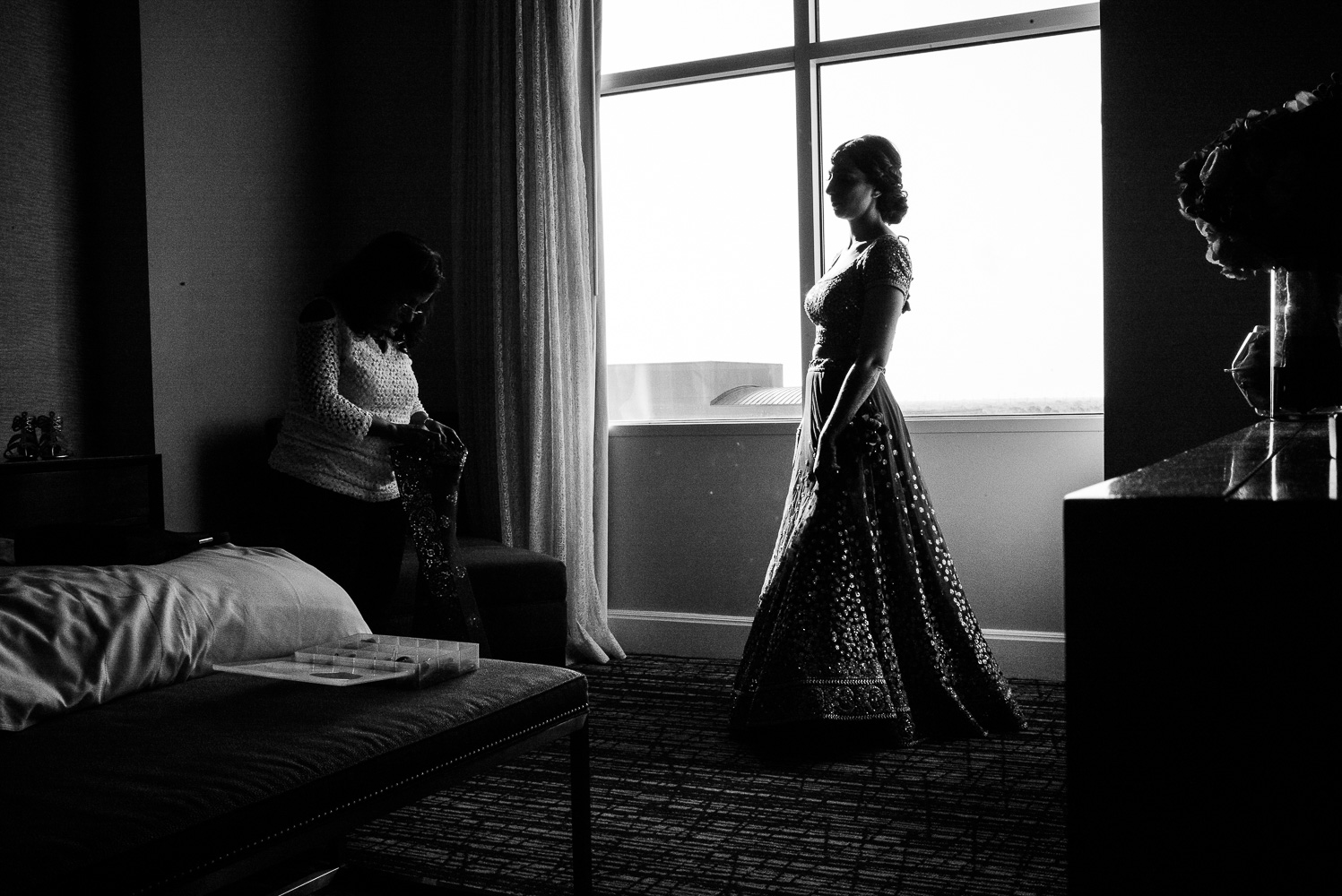 Bride in sari wats in window at Sugar Land Marriott Hindu Jewish fusion wedding Sugar Land Marriott Hotel Texas-018