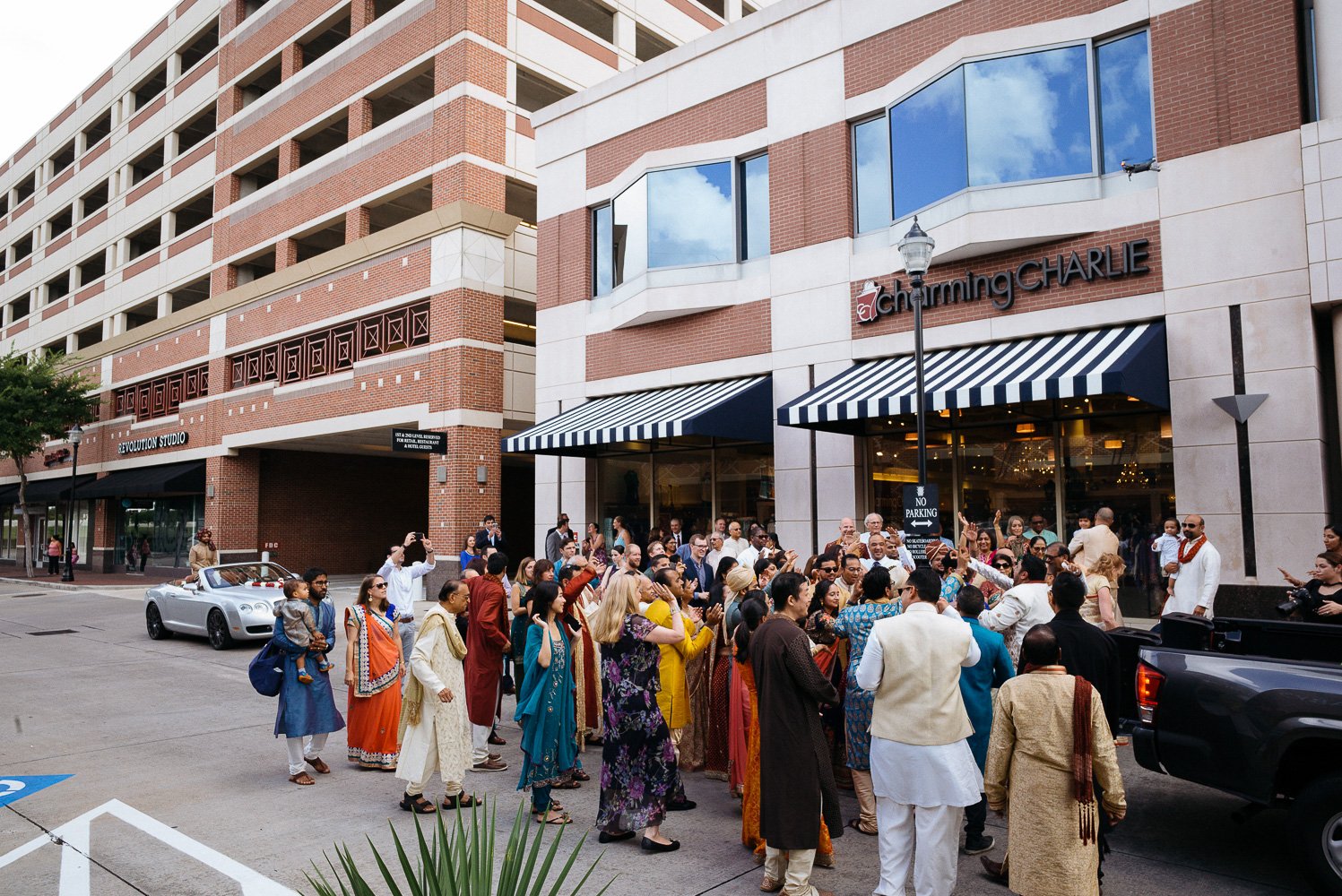 Wide shot of baraat at Sugar Land Marriott Hindu Jewish fusion wedding Sugar Land Marriott Hotel Texas-034