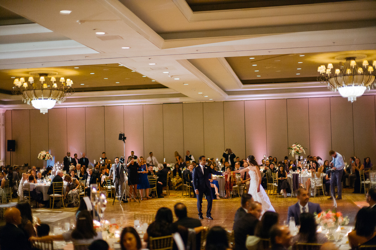 Wide shot of couple dancing reception Hindu Jewish fusion wedding Sugar Land Marriott Hotel Texas-080