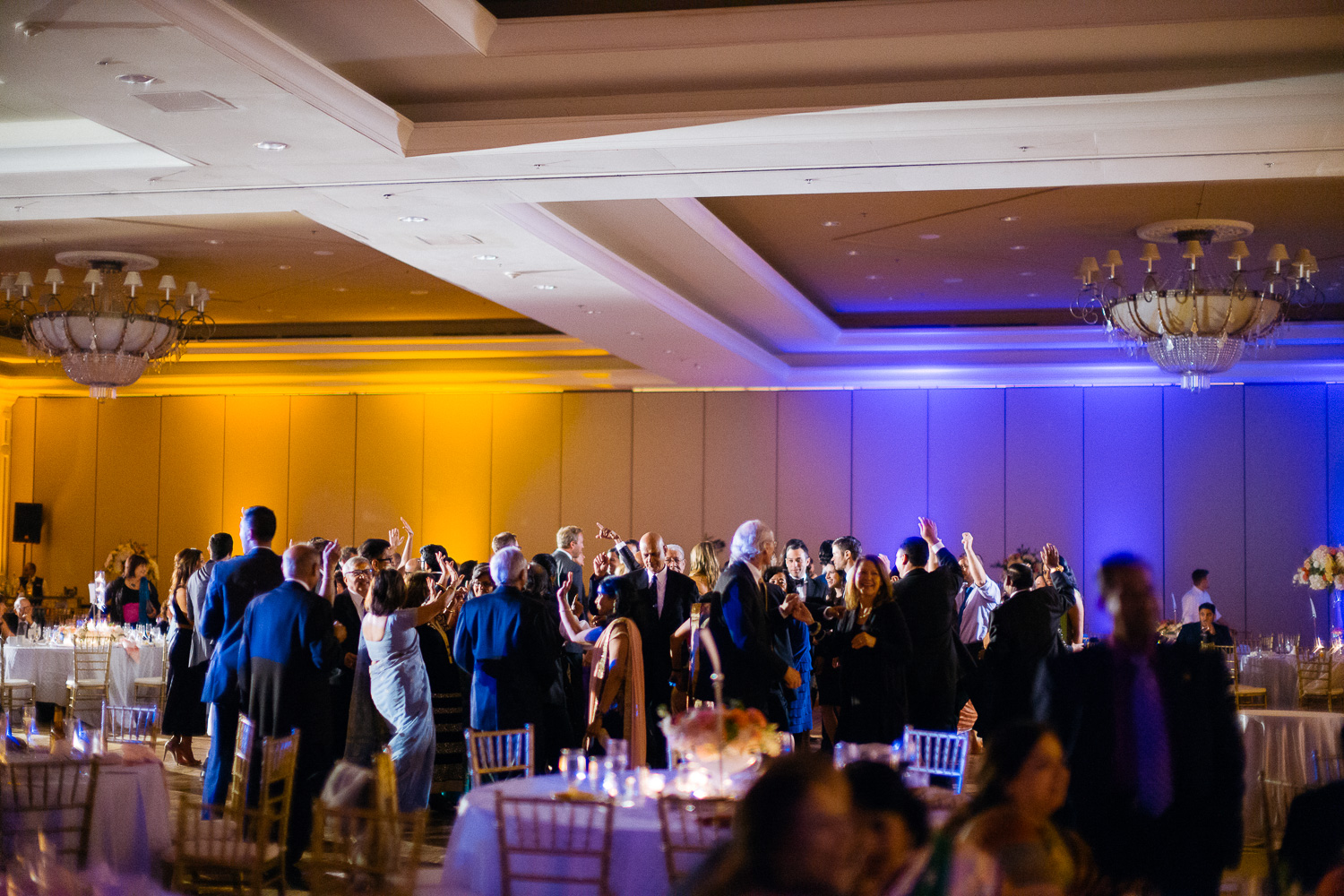 Wide shot of guests at wedding reception Hindu Jewish fusion wedding Sugar Land Marriott Hotel Texas-088