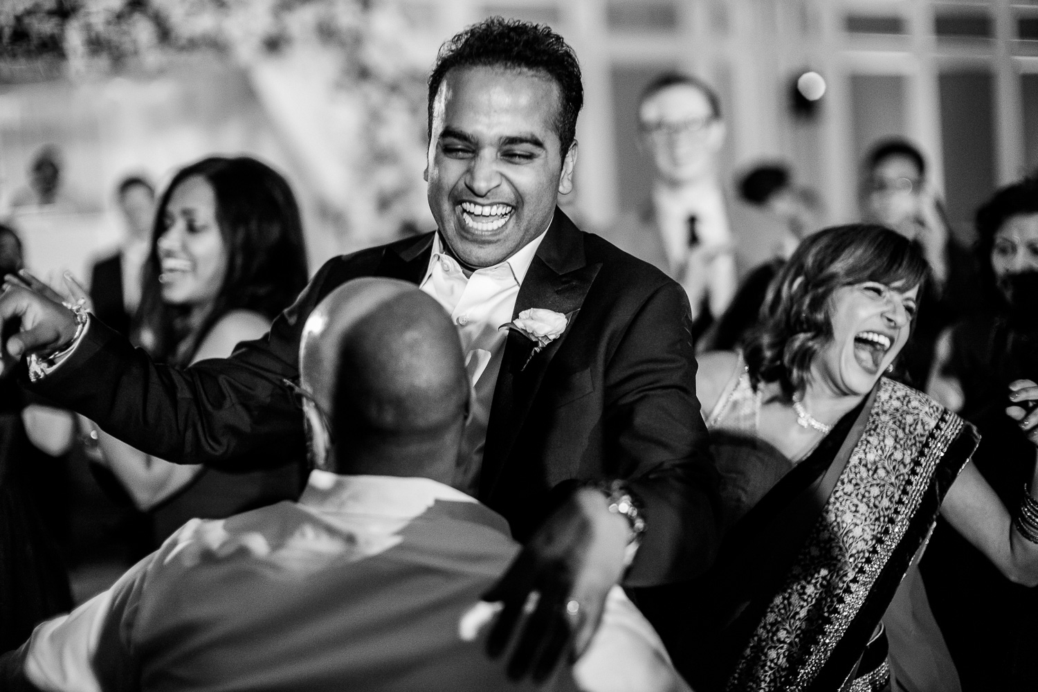 Groom lifted by friend Hindu Jewish fusion wedding Sugar Land Marriott Hotel Texas-089