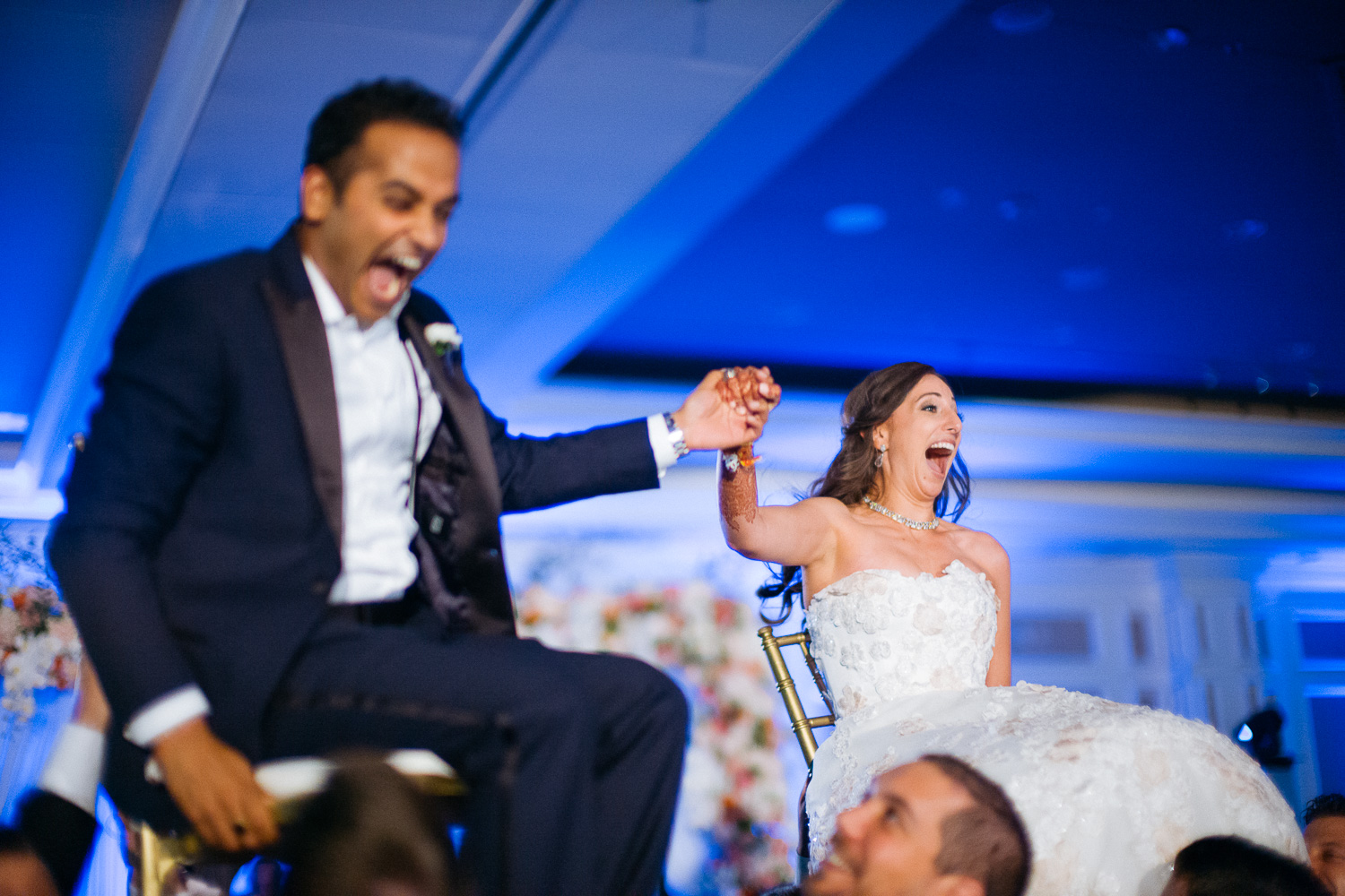 Traditional horah dance with married couple Hindu Jewish fusion wedding Sugar Land Marriott Hotel Texas-094