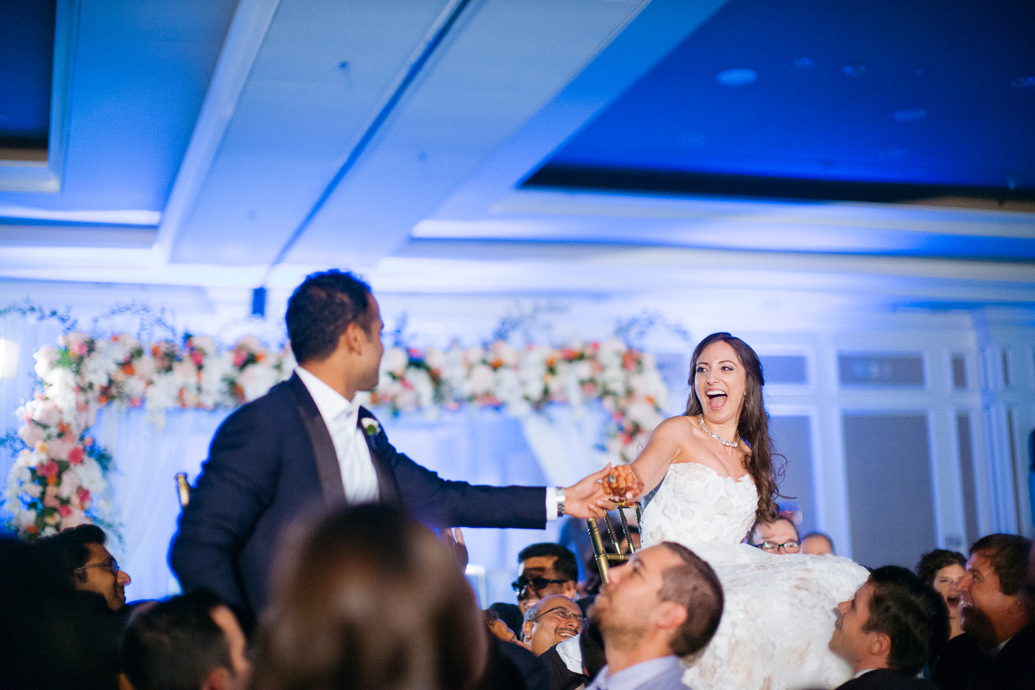 Traditional horah dance with married couple Hindu Jewish fusion wedding Sugar Land Marriott Hotel Texas-094