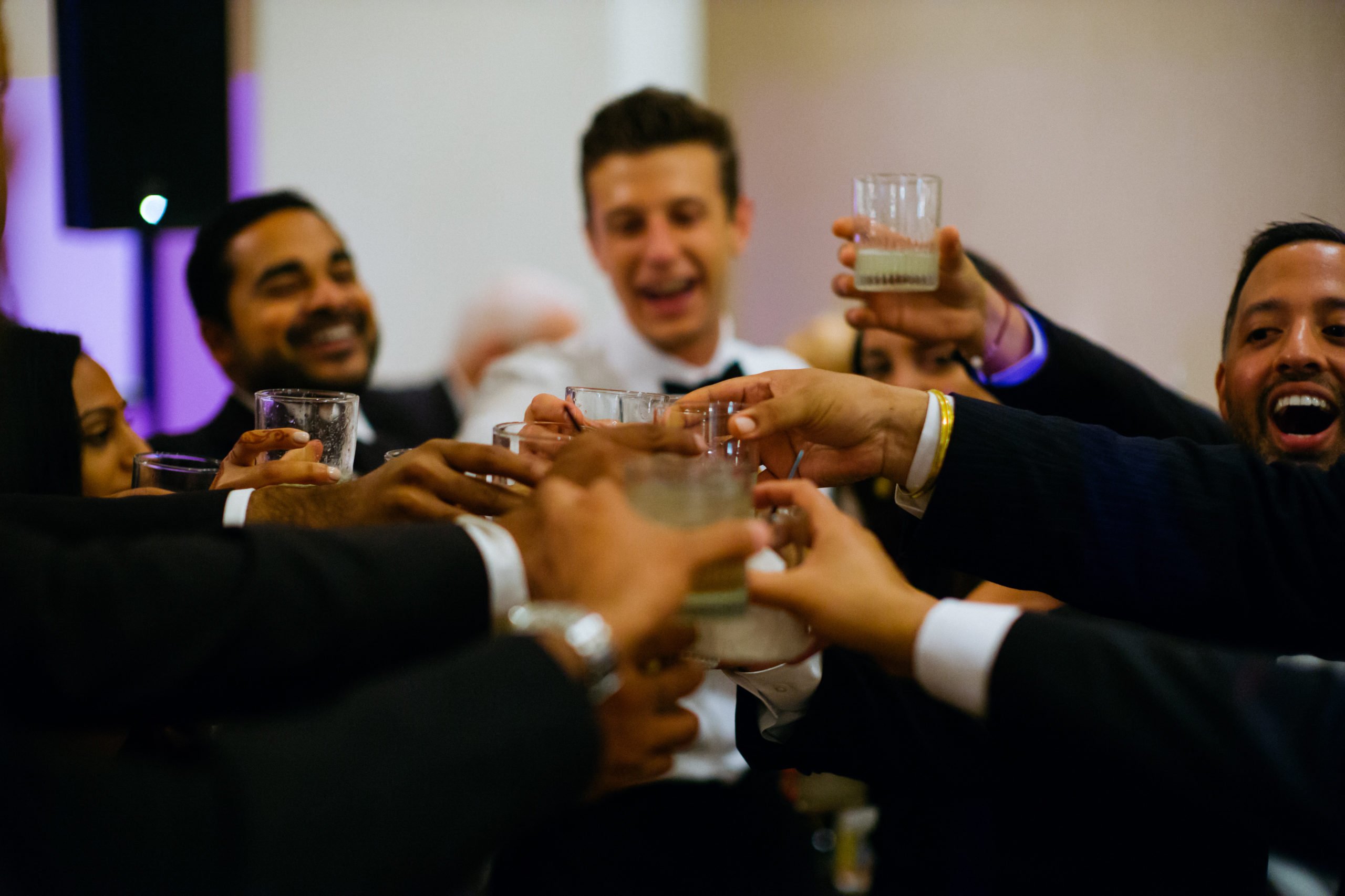 Toasting at a bar Hindu Jewish fusion wedding Sugar Land Marriott Hotel Texas-098