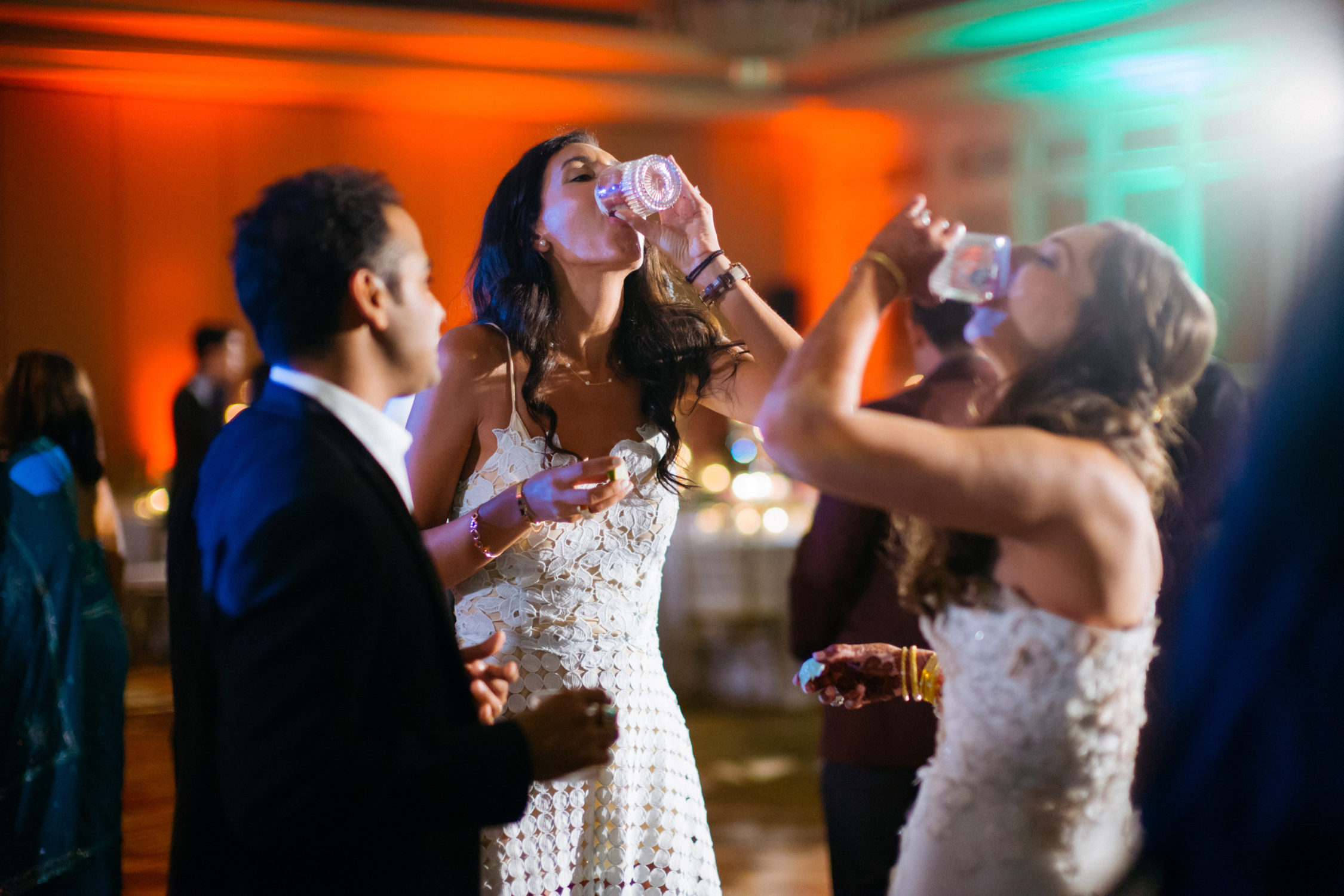 Bride and friends make a toast Hindu Jewish fusion wedding Sugar Land Marriott Hotel Texas-099