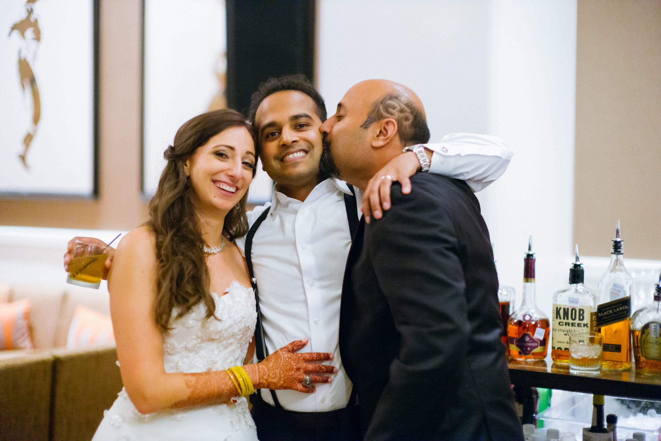 Friends gather in photo Hindu Jewish fusion wedding Sugar Land Marriott Hotel Texas-101