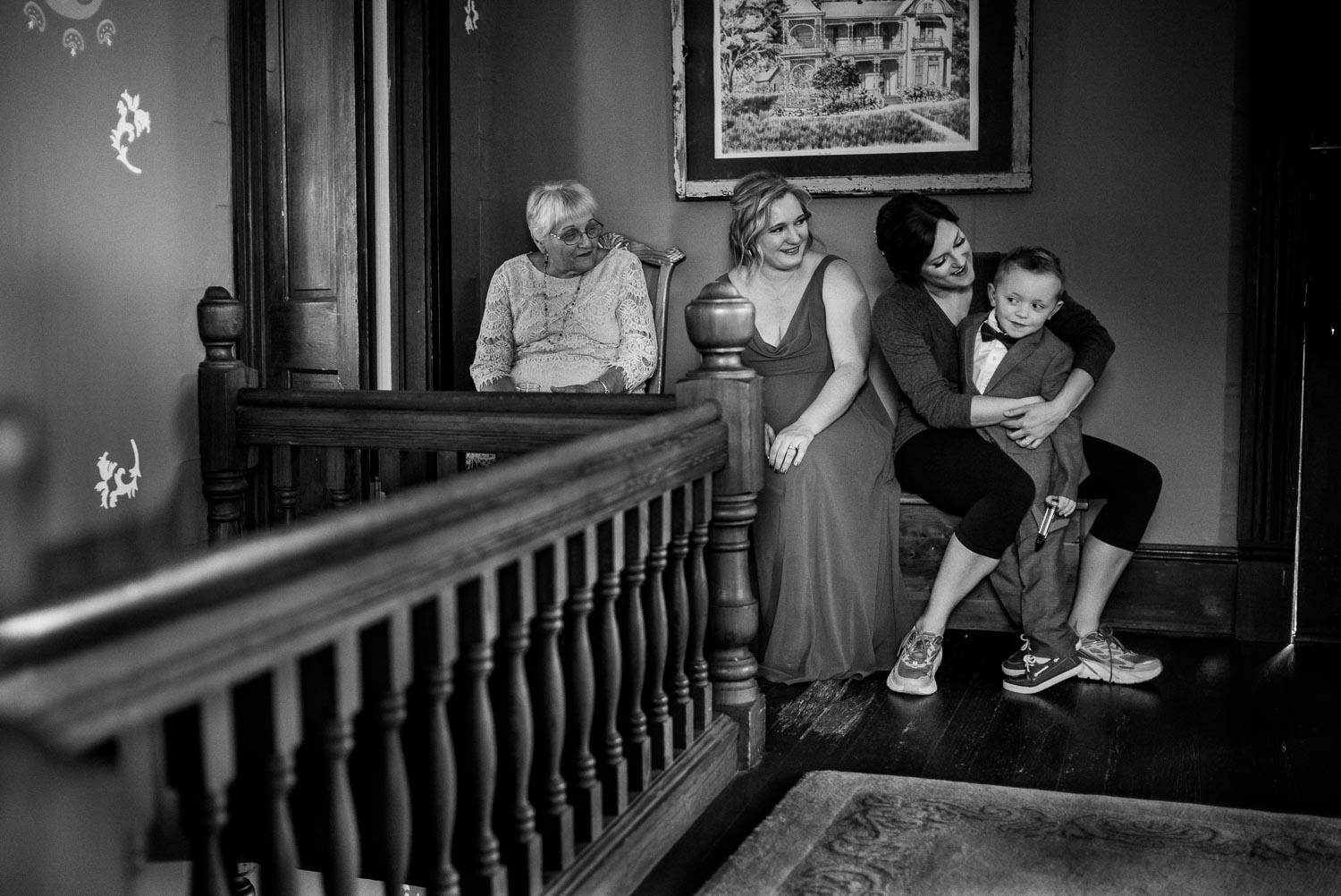 A little boy cuddles with the bride at Barr Mansion Austin Wedding Photos-Philip Thomas